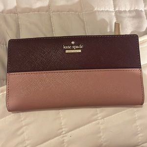 Purple and pink Kate spade wallet, slightly used, zipped outer pocket
